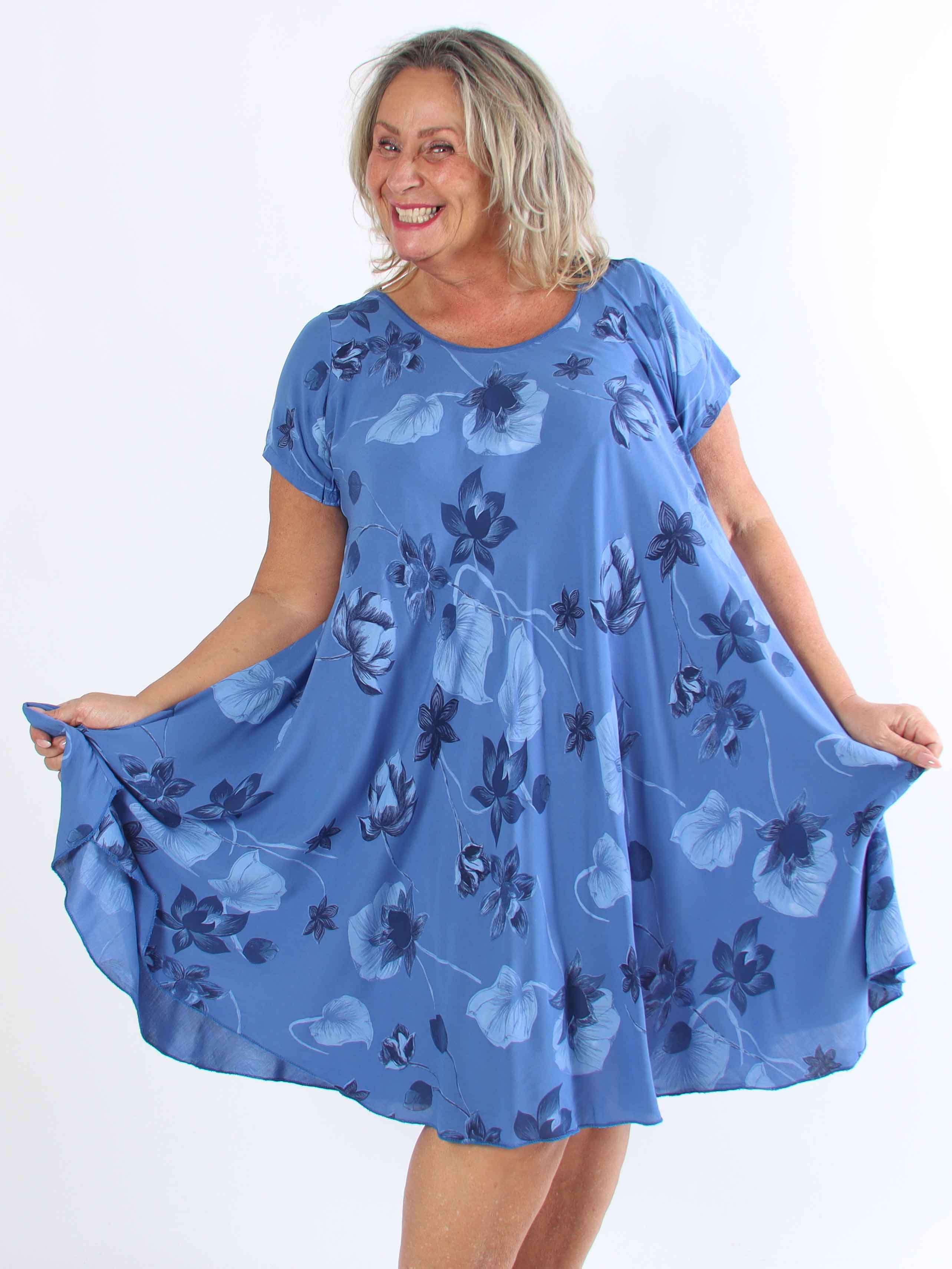 Bora - Söt tunikaklänning i bomull med blommigt tryck i plusstorlek